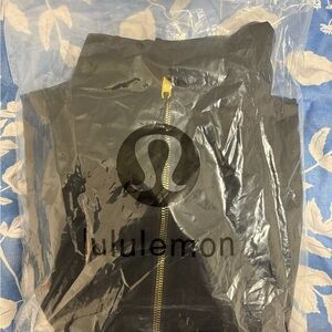Lululemon Athletica Black Jacket with Gold Accents